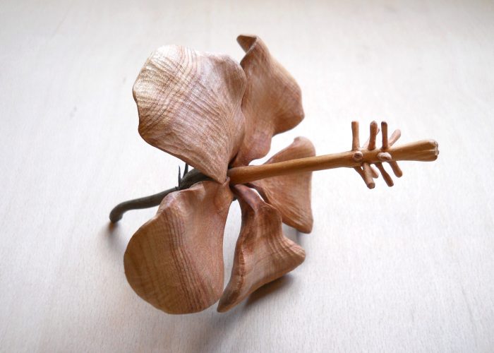 woodcarving of hibiscus flower for Peaches Golding
