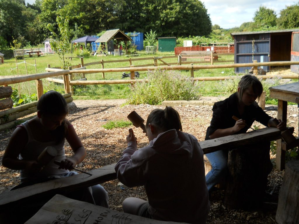 Children carving at Lawrence Weston City Farm