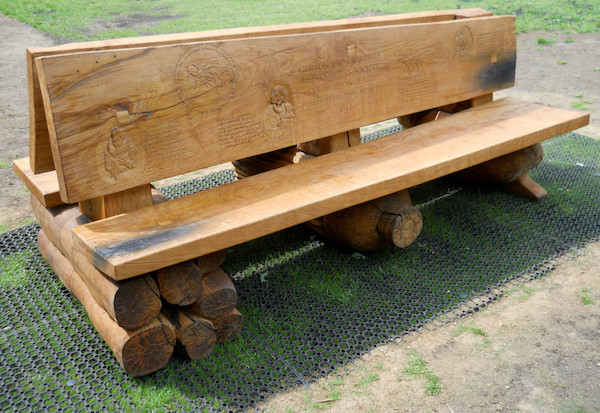large wooden double sided bench at Clifton Downs in Bristol